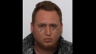 Daylo Robinson, 27, is shown in a Toronto police handout image.