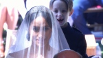 This image of one of the Mulroney twins grinning behind Meghan Markle has gone viral.