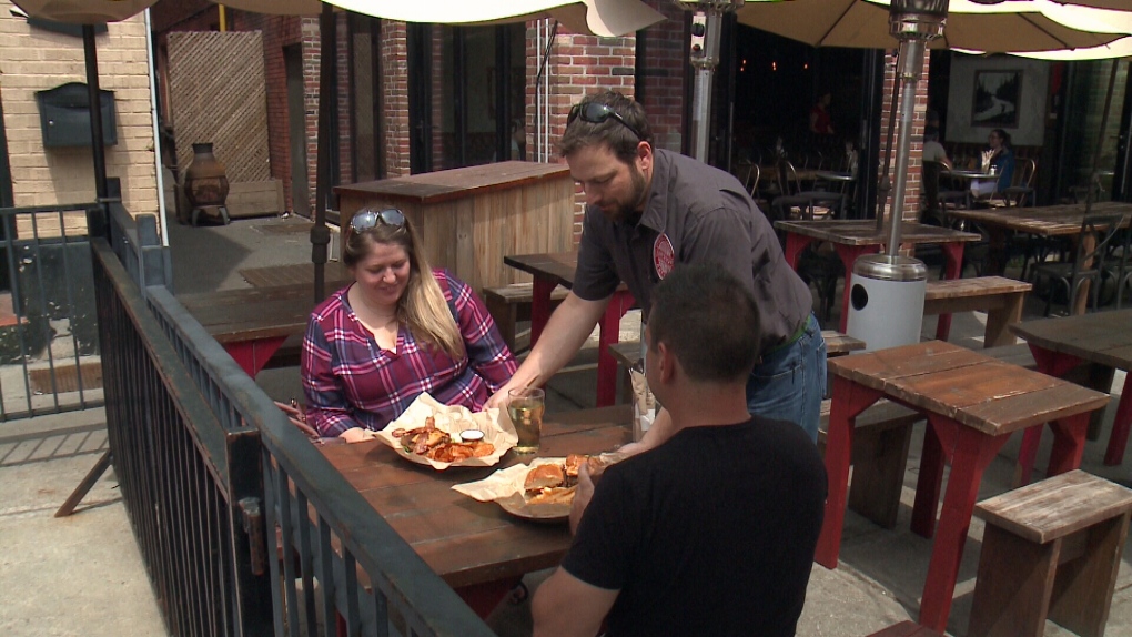 Ottawa residents enjoy lunch at outdoor patio.