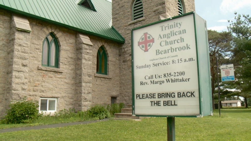 The  sign out front of Trinity Anglican Church in Bearbrook is asking for the culprit(s) to 'Please bring back the bell' after it is suspected to have been stolen from the belfry sometime last week. (CTV Ottawa) 