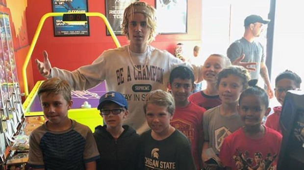 Justin Bieber poses with young fans at the Laser Quest in Kitchener on Saturday. (Photo: Instagram/justinbieber)