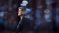 Ontario Liberal Leader Kathleen Wynne is pictured between glasses as she speaks during a campaign stop at Crosscut Distillery in Sudbury, Ont., on Wednesday, May 23, 2018. THE CANADIAN PRESS/Nathan Denette