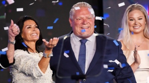 Ontario PC leader Doug Ford reacts with his wife, Karla, left, after winning the Ontario Provincial election to become the new premier in Toronto, on Thursday, June 7, 2018. THE CANADIAN PRESS/Nathan Denette