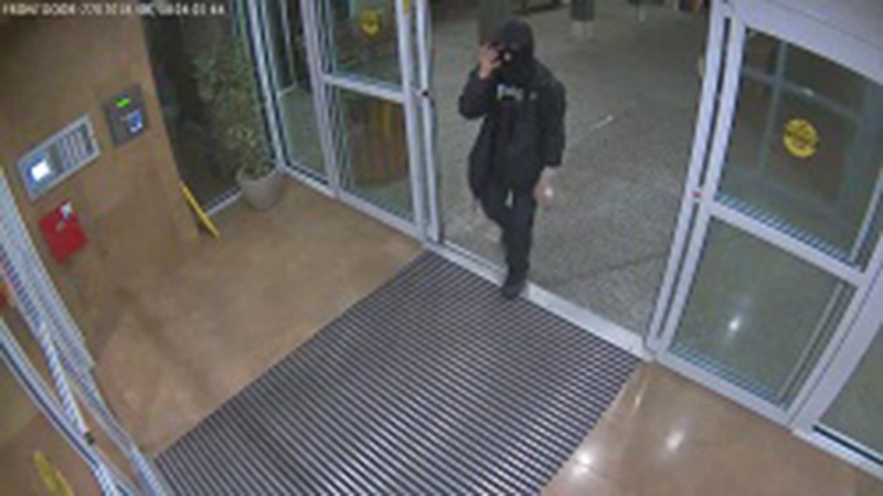Surveillance footage of a masked man