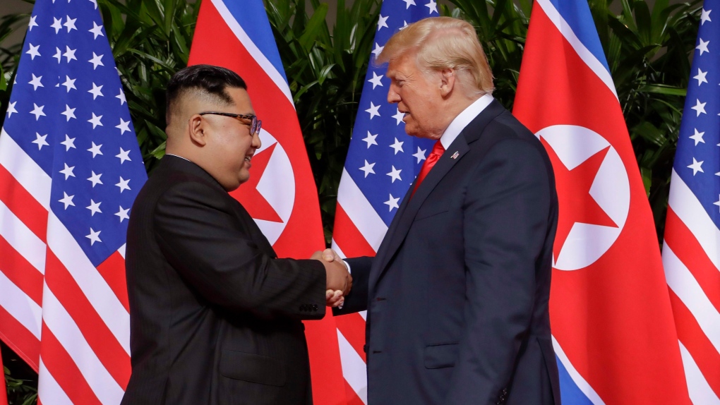Trump Kim handshake 