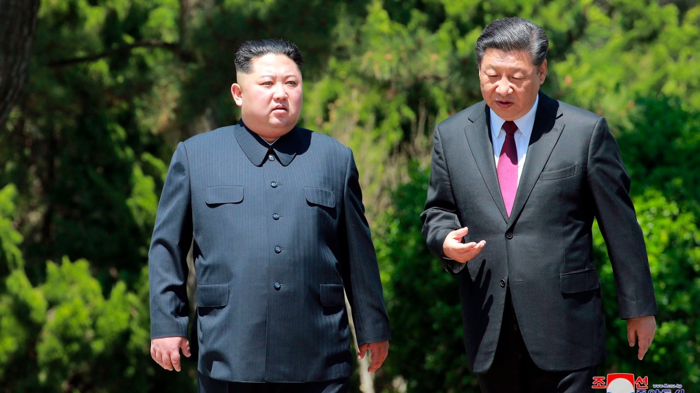Kim Jong Un and Chinese President Xi Jinping 
