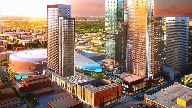 A graphic shows the updated design for Block BG (foreground), a mixed-use tower near Rogers Place in the Ice District in downtown Edmonton.