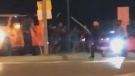 A group of people are seen in this video footage clip assaulting each other using what appears to be baseball bats. (Matthew Amini)
