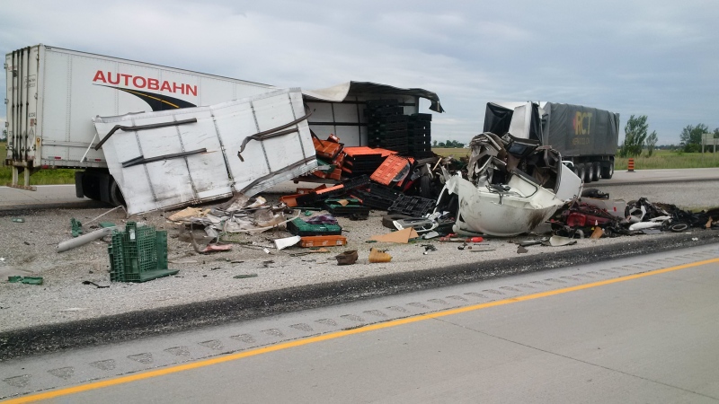 Police say one driver has died after a crash between two tractor trailers on Highway 401 near Tilbury, Ont., on Friday, June 22, 2018. (Courtesy OPP)