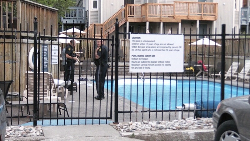 Police at the scene of an apparent drowning at the Mountain Springs Resort just west of Collingwood, Ont., Tuesday, June 26, 2018.