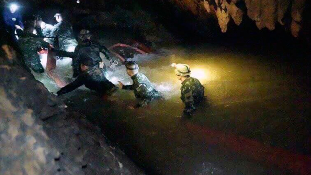 Thai rescue teams inside of cave