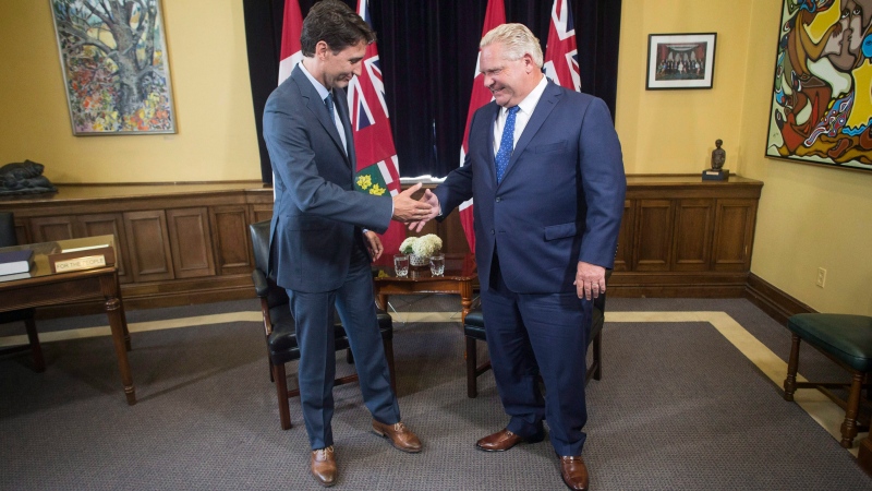 Ontario Premier Doug Ford and Canadian Prime Minister Justin Trudeau pose for a photo at the Ontario Legislature, in Toronto on Thursday, July 5, 2018. THE CANADIAN PRESS/Chris Young