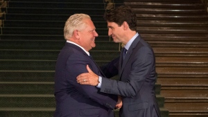 Ontario Premier Doug Ford greets Canadian Prime Minister Justin Trudeau at the Ontario Legislature, in Toronto on Thursday, July 5, 2018. THE CANADIAN PRESS/Chris Young