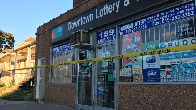 Scene of an armed robbery on Erie St. E. near Goyeau St. on Friday July 6, 2018. (Photo by AM800's Gord Bacon)
