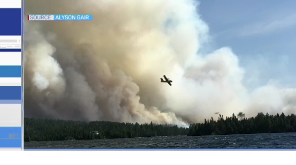 Water bomber dumps water on Temagami forest fire
