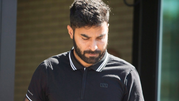 Truck driver Jaskirat Sidhu walks out of provincial court after appearing for charges due to the Humboldt Broncos bus crash in Melfort, Sask., on Tuesday, July 10, 2018. THE CANADIAN PRESS/Kayle Neis