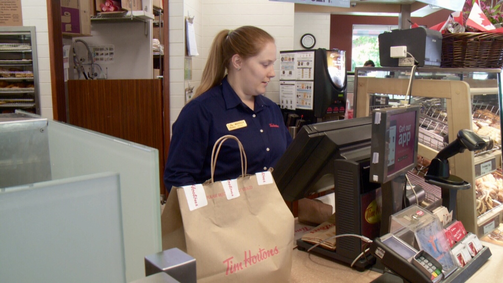 Tim Hortons employee prepares delivery.