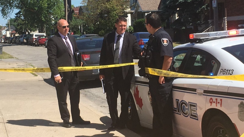 Windsor police officers investigate an assault on Erie St. on July 17, 2018. ( Bob Bellacicco / CTV Windsor )