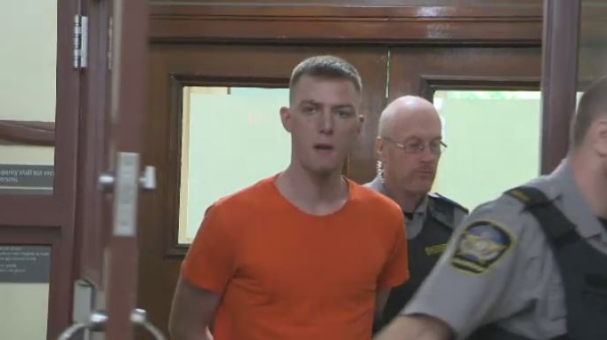 Austin Michael Mitton appears in Halifax provincial court on July 18, 2018.