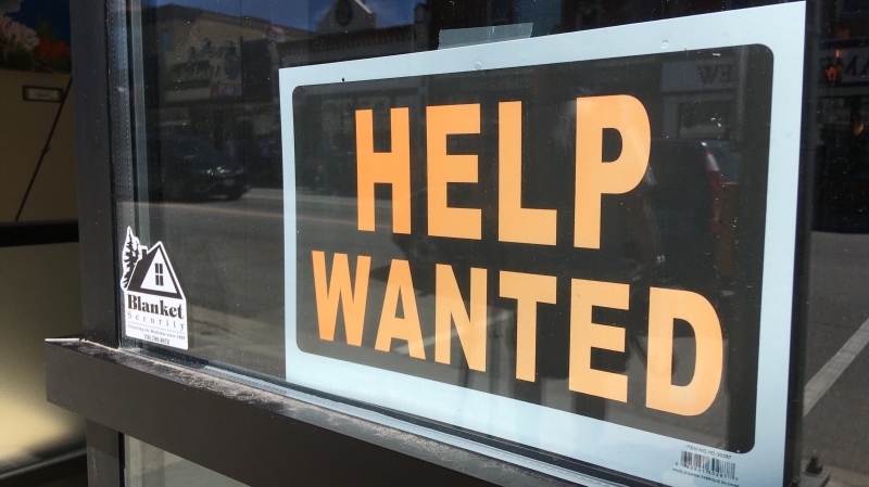 Help wanted signs are visible on Main Street in Huntsville, Ont. on Wednesday, July 18, 2018. (KC Colby/CTV News)