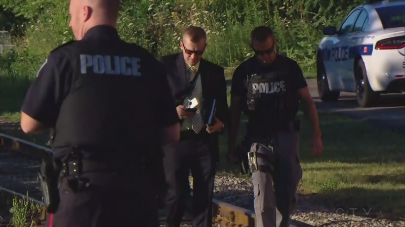 Police investigate an area in Brampton, Ont. where a missing boy was located with life-threatening injuries on Thursday, July 19, 2018. 