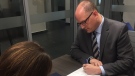 Drew Dilkens files his nomination papers seeking re-election in Windsor, Ont., on Tuesday, July 24, 2018. (Sacha Long / CTV Windsor)