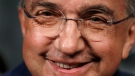 In this July 14, 2015 file photo, Fiat Chrysler Automobiles CEO Sergio Marchionne smiles during a ceremony to mark the opening of contract negotiations with the United Auto Workers, in Detroit. (AP Photo/Paul Sancya)