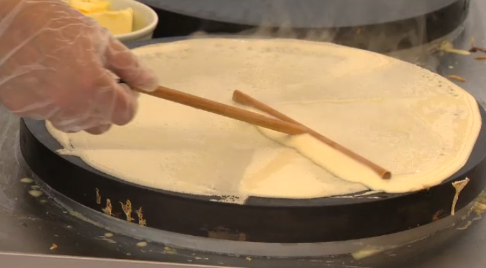 Cooking a dish at the Serbian Food Festival