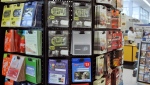Gift cards for various retailers are offered for sale at a supermarket in Omaha, Neb. (AP Photo/Nati Harnik, File)