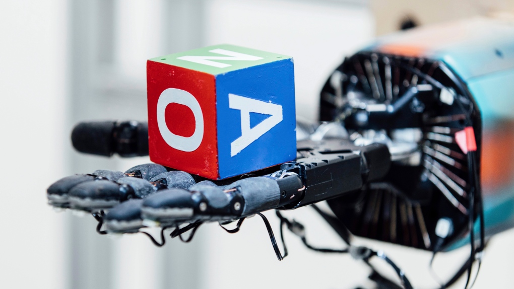 Robotic hand with cube