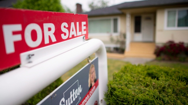 A real estate sign is pictured in Vancouver, B.C., Tuesday, June, 12, 2018. THE CANADIAN PRESS / Jonathan Hayward