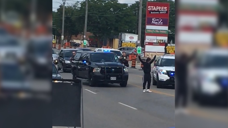 Police conduct a high risk arrest at Wellington and Baseline on Friday, August 3, 2018. (Witness Video) 