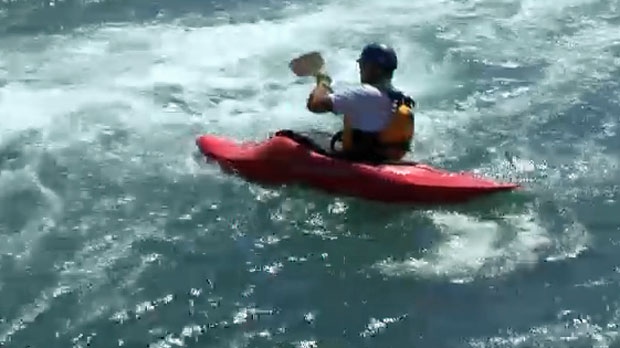 Kayaker enjoys Harvie Passage