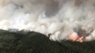FILE - The South Stikine River fire burns in an Aug.6, 2018 handout photo provided by the BC Wildfire Service. THE CANADIAN PRESS/HO-BC Wildfire Service