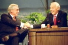 Ed McMahon, left, shakes hands with talk show host Johnny Carson, during their final taping of the 'Tonight Show' in Burbank, Calif., on May 22, 1992. (AP / Douglas C. Pizac)