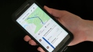 In this Aug. 8, 2018, file photo a mobile phone displays a user's travels using Google Maps in New York. (AP Photo/Seth Wenig, File)