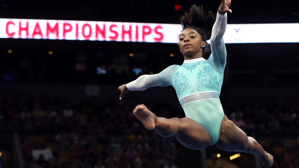 Simone Biles competes on the floor exercise 