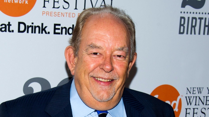 In this Oct. 17, 2013 file photo, Robin Leach attends the Food Network's 20th birthday party in New York. Leach, whose voice crystalized the opulent 1980s on TV's "Lifestyles of the Rich and Famous," has died, Aug. 24, 2018. (Charles Sykes/Invision/AP, File)