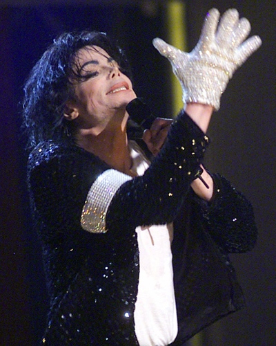 Michael Jackson sports his trademark glove as he performs "Billie Jean" during his "30th Anniversary Celebration, The Solo Years" concert at New York's Madison Square Garden on Sept. 7, 2001. (AP / Beth A. Keiser)