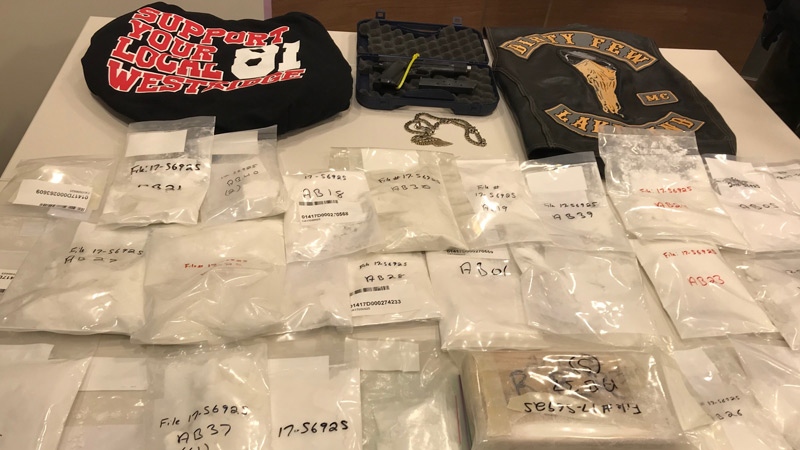 ALERT displays some items, including drugs and gang paraphernalia, at a news conference related to a drug trafficking investigation dubbed Project Entry on Thursday, August 30, 2018.