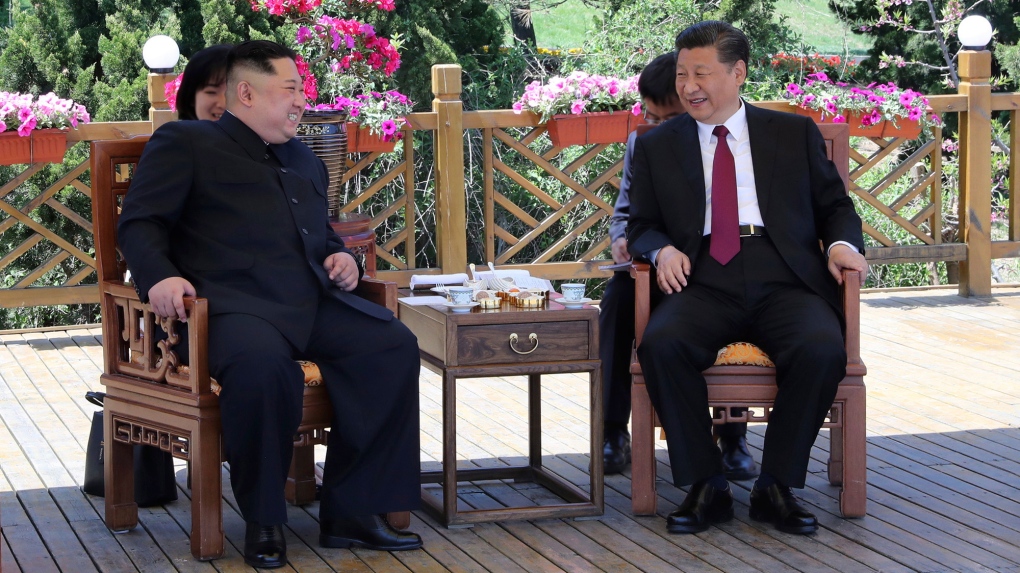 China's Xi Jinping and Kim Jong Un