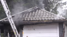 A house fire in Kitchener spread to a nearby detached garage on Tuesday morning.