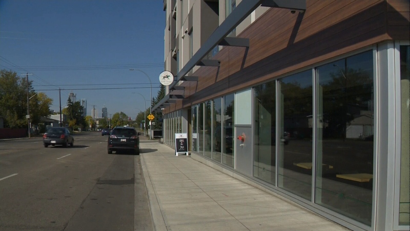 An Edmonton business owner has successfully appealed the city's denial of a new development next door, after residents raised parking concerns. 