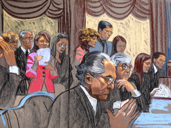In this courtroom sketch, Bernard Madoff, center, is seated in front of some of his victims that spoke during his sentencing in Manhattan federal court in New York, Monday, June 29, 2009. (AP / Christine Cornell)