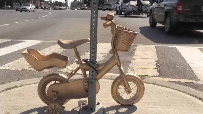These golden bikes around the region represent a child with cancer no longer being able to ride.