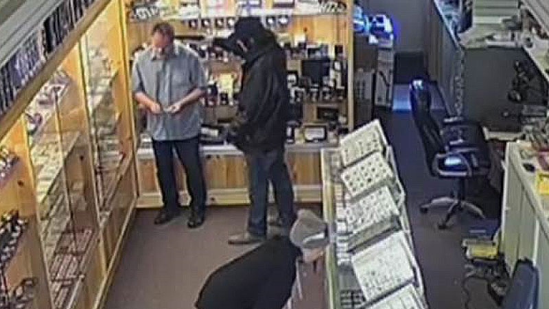 Surveillance video supplied to CTV Edmonton shows an armed robbery in a coin and currency shop on Wednesday, Sept. 19, 2018.