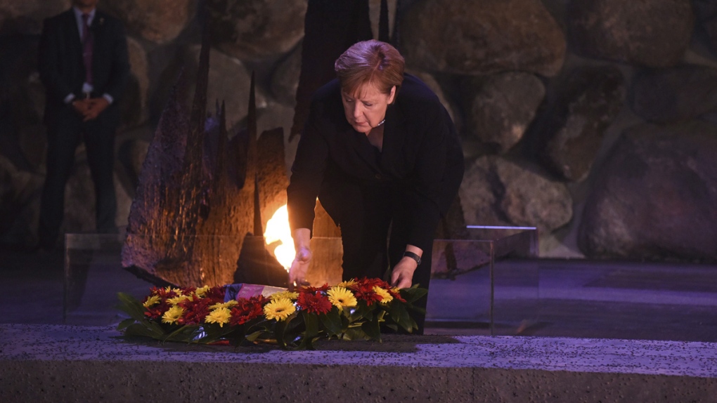 Merkel lays a wreath