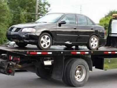 Police pulled four bodies from this black 2004 Nissan Sentra.