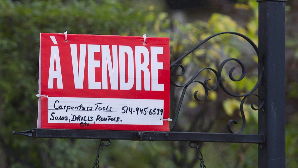 A home for sale sign in Montreal