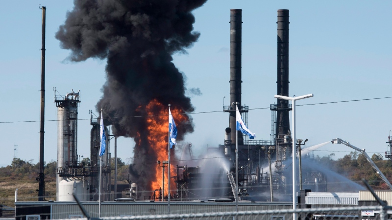 Flame and smoke erupts from the Irving Oil refinery in Saint John, N.B., on Monday, September 8, 2018. (THE CANADIAN PRESS/Stephen MacGillivray)